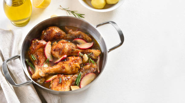 istock Chicken drumsticks baked with apples 1349046697