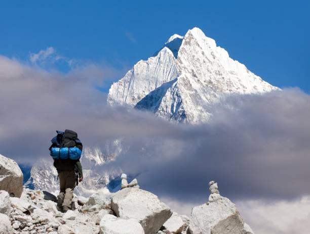 istock Mount Thamserku with tourist Nepal himalayas mountains 1349046830