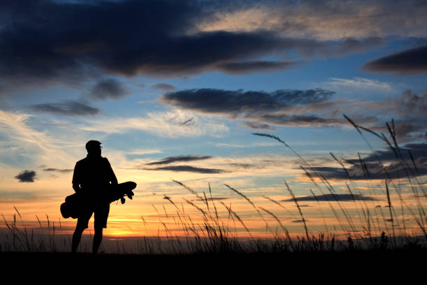 istock Male Golfer Silhouette on Links Golf Course 1349049425