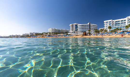 Clear water of the Mediterranean Sea on the sunny beach of Protaras in Cyprus