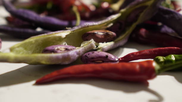 istock Purple beans and hot peppers 1349057493