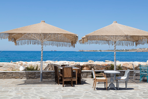 Waterside tables and chairs, Greek island