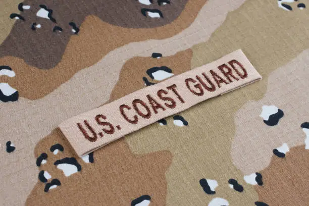 US COAST GUARD branch tape on desert camouflage uniform