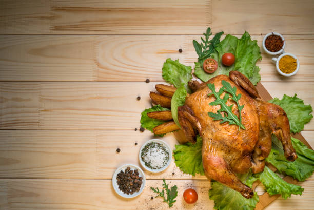 istock fried chicken or turkey on a wooden board with herbs 1349063144