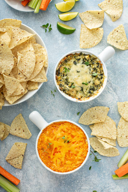 istock Artichoke spinach and buffalo chicken dips with chips 1349067629