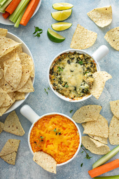 istock Artichoke spinach and buffalo chicken dips with chips 1349067632