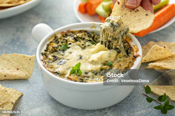 Artichoke Spinach Dip Stock Photo - Download Image Now - Dipping Sauce, Dipping, Spinach