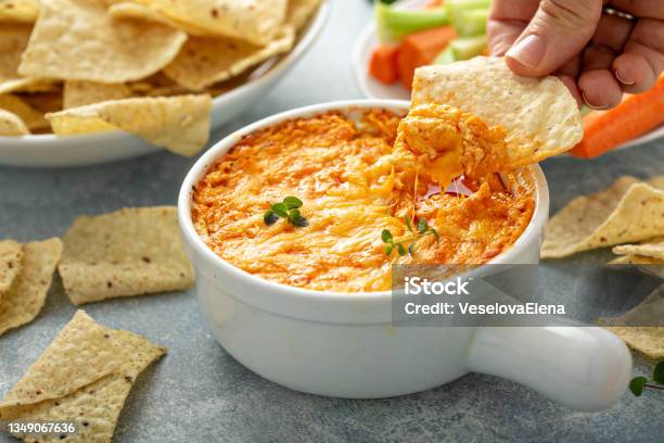 Buffalo Chicken Dip With Chips Stock Photo - Download Image Now - Dipping Sauce, Dipping, Buffalo Chicken Wings