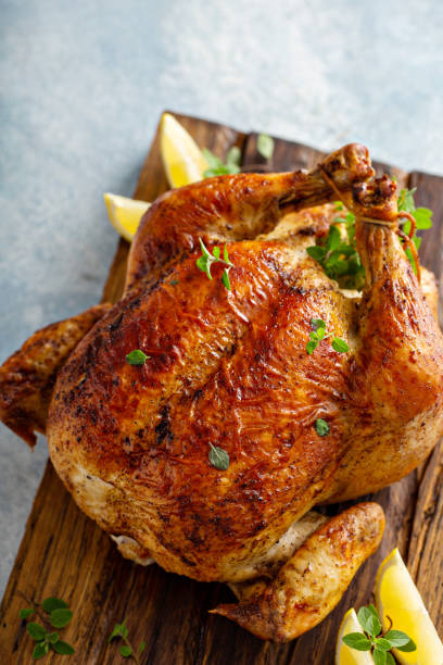 istock Roasted chicken with lemon and herbs 1349067666