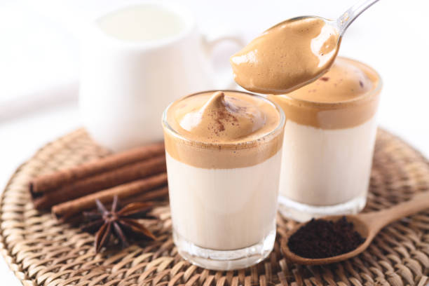 istock Dalgona coffee, Fluffy cream coffee whipping on milk 1349068882