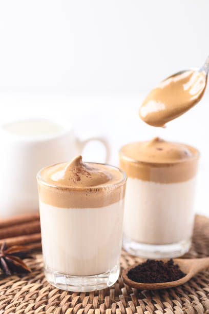 istock Dalgona coffee, Fluffy cream coffee whipping on milk 1349068895