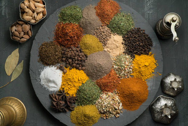 istock spices on a dark background surrounded by oriental dishes, top view 1349070377