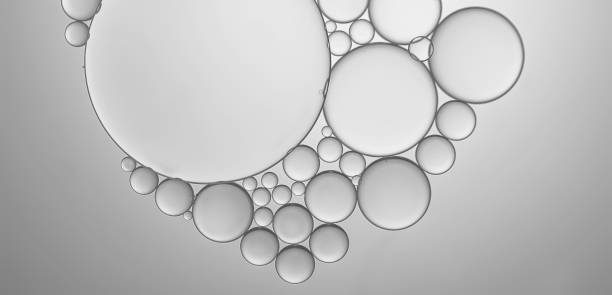 istock Abstract background of oil droplets on water creative art image and shape. 1349072268