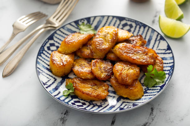istock Fried caramelized plantains served with lime wedges 1349072472