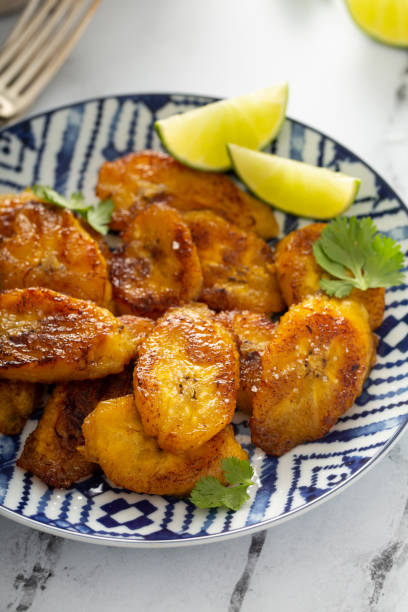 istock Fried caramelized plantains served with lime wedges 1349072477