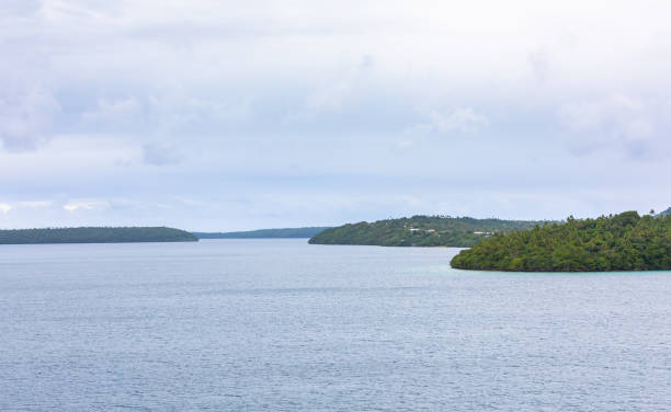 Landscape  of ocean and a small island view .
