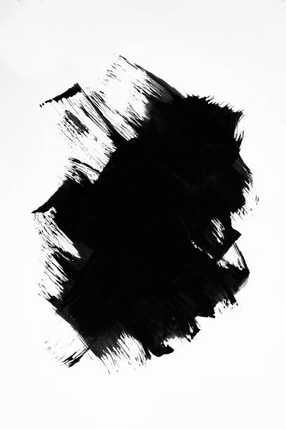 istock Black ink brush stroke isolated on white background. 1349074158