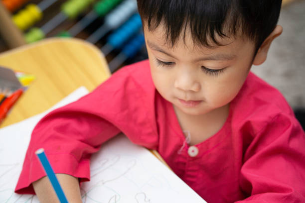 istock Adorable asian little boy at home exploring his surrounding 1349076740
