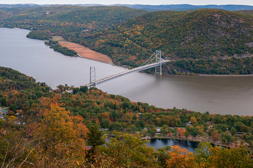 Ceremonially named the Purple Heart Veterans Memorial Bridge, this suspension bridge in New York State carries US 6 and US 202 across the Hudson River between Bear Mountain State Park in Orange County and Cortlandt in Westchester County.
