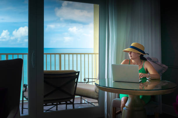 istock Hispanic woman on an office with an ocean view 1349086011
