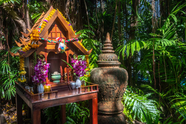 Spirit house in a tropical garden Buddhist shrine in a garden on Koh Chang island in Thailand koh chang stock pictures, royalty-free photos & images