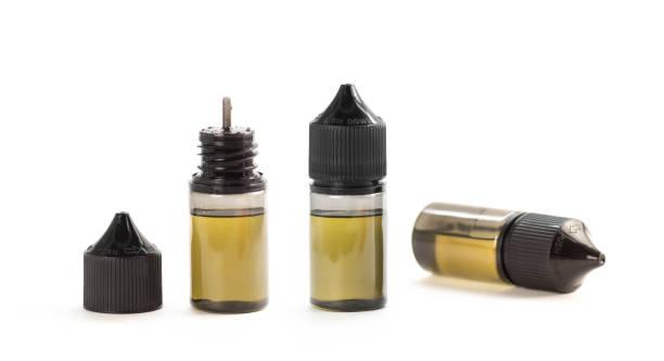istock A bottles of liquid for an electronic cigarette. Close up 1349095735