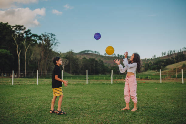 istock brothers playing outdoors 1349095974