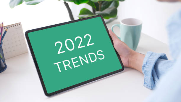 istock 2022 trends on digital tablet  screen background, business plan and technology concept 1349098444