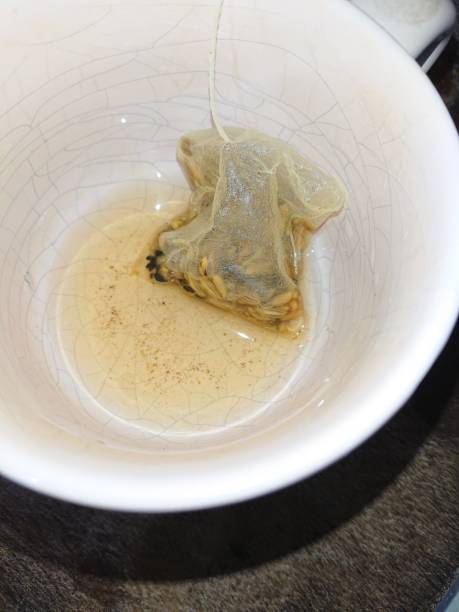 istock Depok Indonesia October 26, 2021, leftover herbal teabags in the cup 1349100513