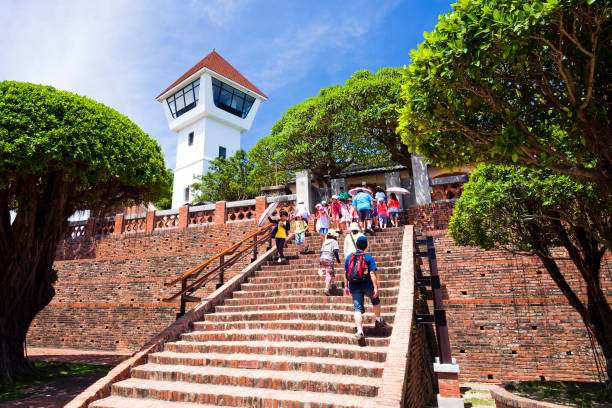 Building view of the Chihkan Tower (Fort Provintia) in Tainan, Taiwan. Tainan, Taiwan- July 10, 2012: Tourists are visiting the Chihkan Tower in Tainan, Taiwan. It is one of the most popular attractions in Tainan. ancient chinese weapons stock pictures, royalty-free photos & images