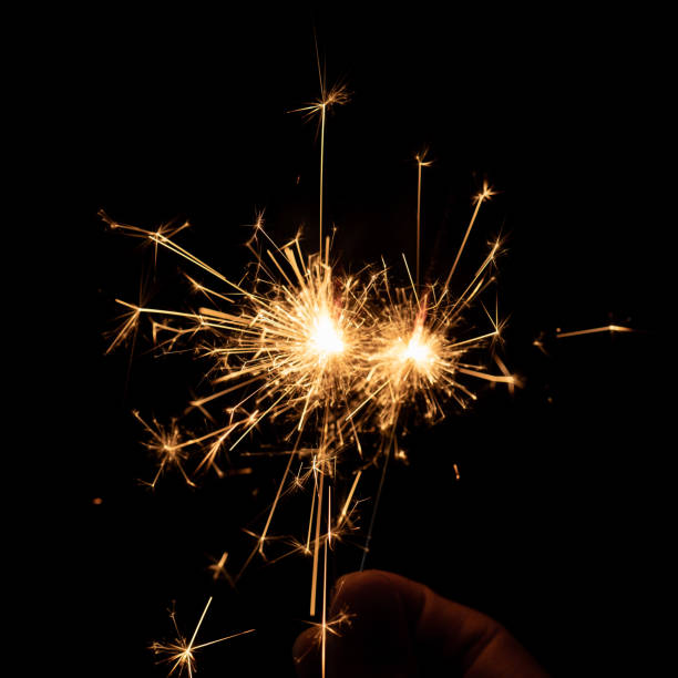 istock Bengal fire on black background, burning sparklers light
in celebration 1349102666