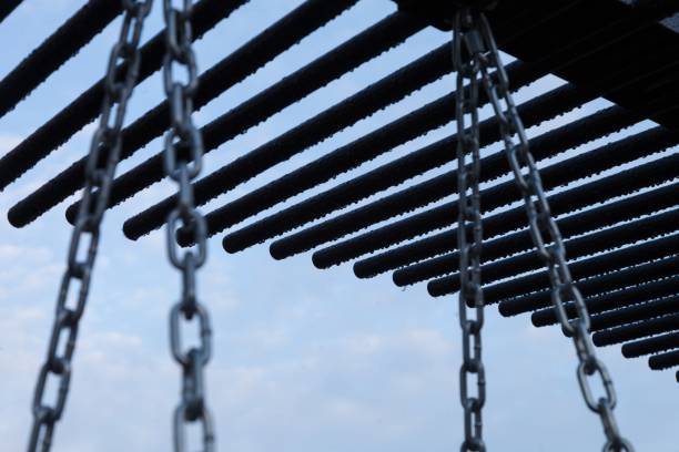 raindrops on black iron against the background of the sky
