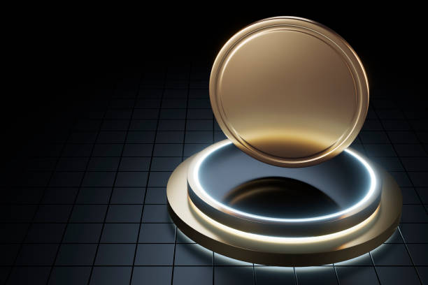 istock High angle view - 3D rendered image of blockchain technology (digital cryptocurrency) token /coin levitating on gold and black pedestal and black background / Concept of blockchain, decentralized financial system 1349110799