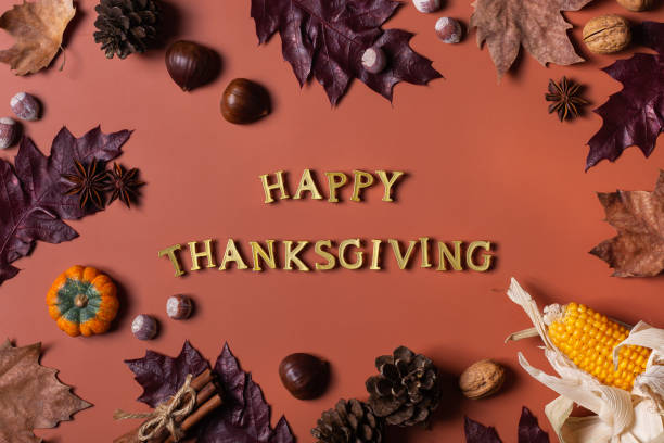 istock Autumn fall thanksgiving day composition with decorative dried leaves 1349114271