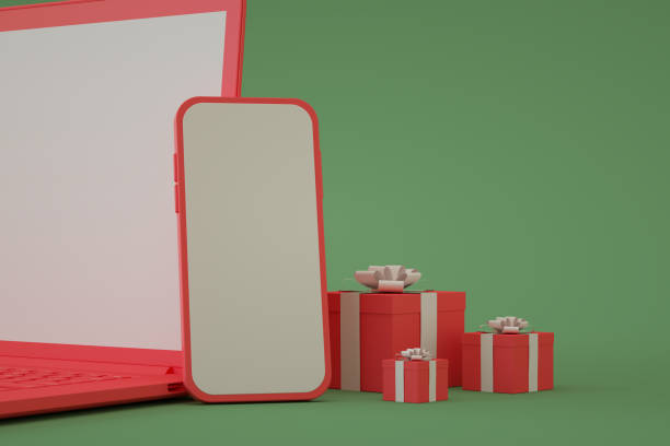 istock Blank screen mobile smart phone and laptop with gift boxes, online shopping 1349116509