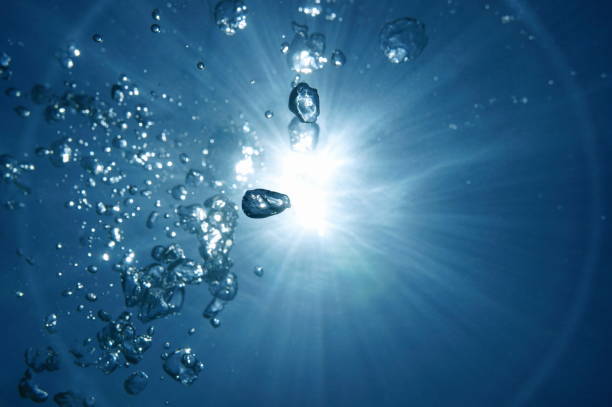 istock Sunlight with air bubbles underwater natural scene 1349117419