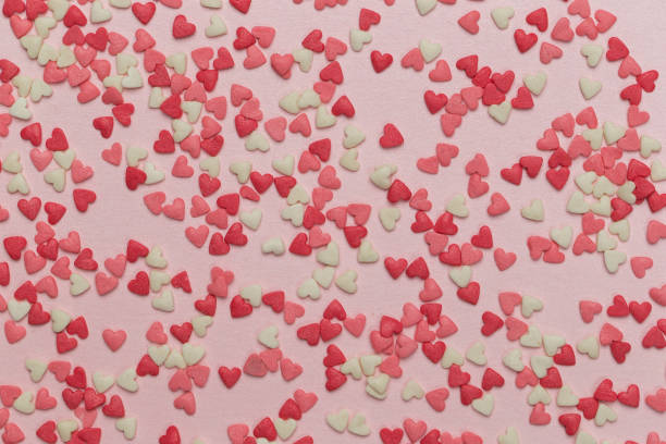 istock Hearts on a pink background 1349118766