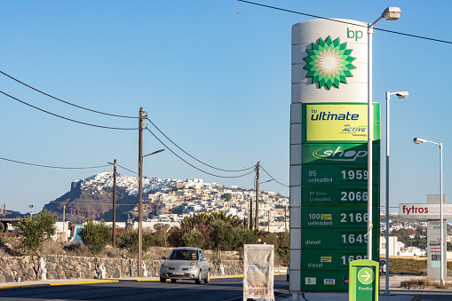 BP Ultimate Gas Station near Firá in Santorini, Greece, with a person visible driving a car
