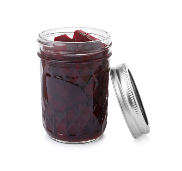 istock Pickled beets in jar isolated on white 1349121669