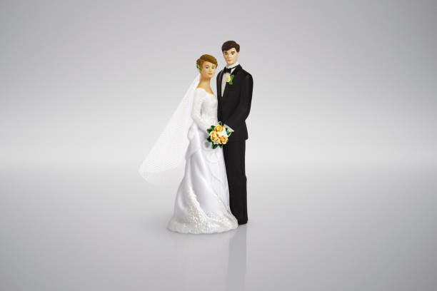 istock bride and groom wedding cake toppers 1349123323