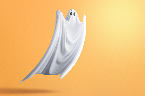 White ghost haunting with a colored background. Halloween concept