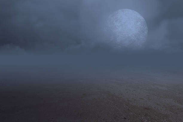 istock Wooden table with a full moon with dark cloudscapes on the night 1349124929