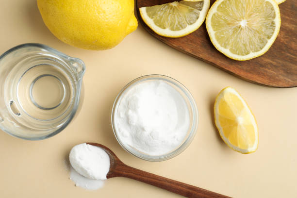 istock Baking soda, lemons and vinegar on beige background, flat lay 1349126480