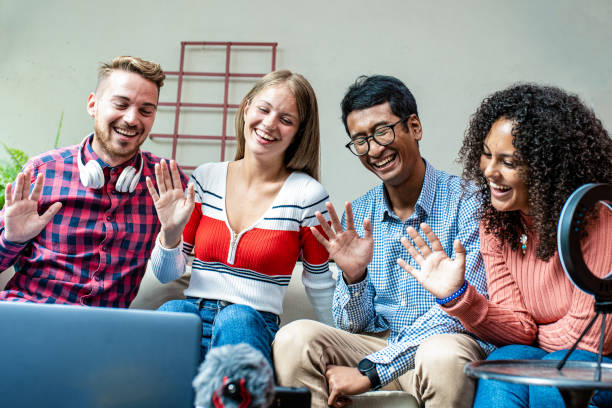 istock modern lifestyle concept with smart millennial person having fun vlogging live feeds on social media networks, young happy friends sharing content on streaming platform with modern devices 1349134942