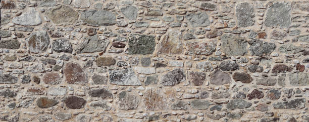 istock Part of old castle stone wall texture background 1349135081