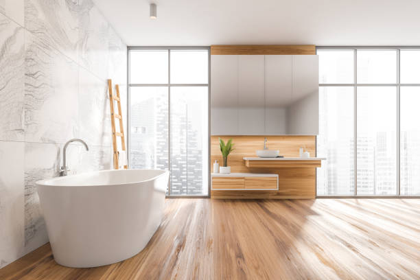 istock Front view on bright bathroom interior with bathtub 1349137882