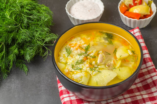 istock Deep plate of chicken rice soup on the table 1349138154