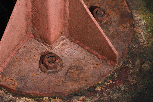 rusty bolt and nut with washer on  the steel construction . corrosion of steel