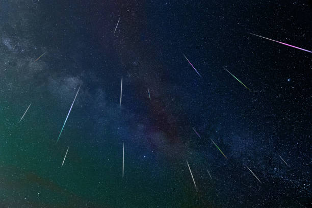 istock Evening sky with meteor, shooting stars and Milky Way. 1349140180