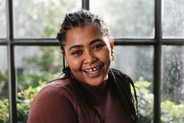 teenage girl portrait at home - toothless grin imagens e fotografias de stock